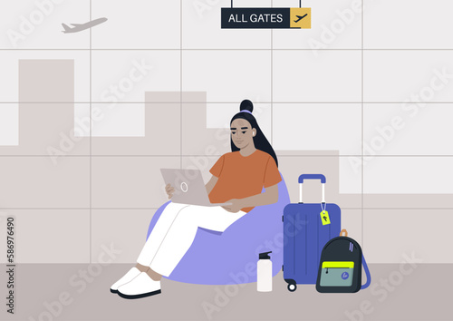 A young Asian character sits on a bean bag chair while typing on their laptop in the airport business lounge