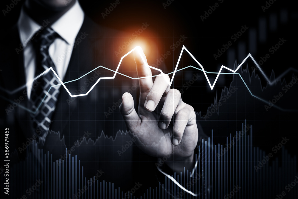 Businessman analyst working with digital finance business data graph showing technology of investment strategy for perceptive financial business decision. Digital economic analysis technology concept. 스톡 사진 - Adobe Stock