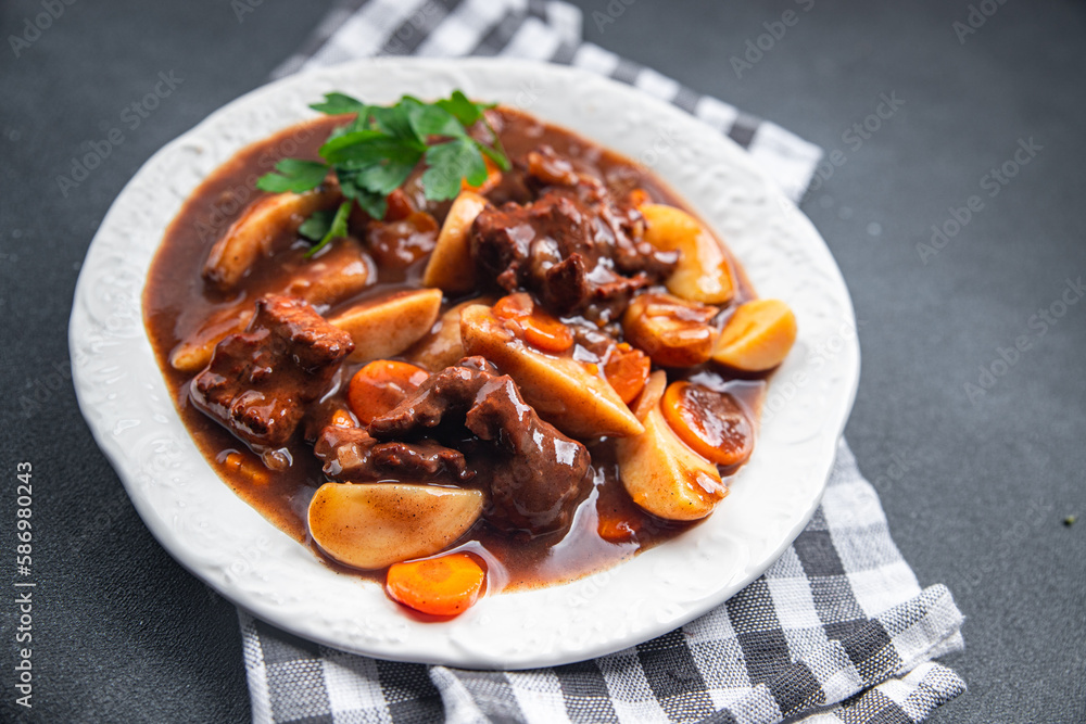 beef bourguignon meat dish with vegetables ready to eat healthy meal food snack on the table copy space food background rustic top view beef bourguignon meat dish with vegetables ready to eat healthy meal food snack on the table copy space food background rustic top view