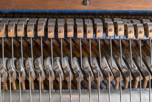 A view inside a very old piano.