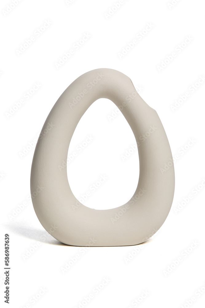 Close-up shot of a beige ceramic scandinavian vase. An empty geometric vase is isolated on a white background. Home decor element. Front view. Close-up shot of a beige ceramic scandinavian vase. An empty geometric vase is isolated on a white background. Home decor element. Front view.