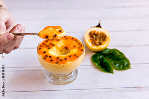 piece of passion fruit mousse on spoon