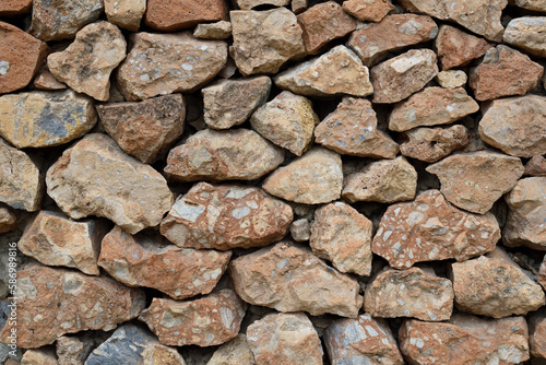 Fotografia de un muro de piedra para usar como fondo