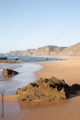 Rock and Shore with Cliff, Castelejo Beach; Algarve; Portugal photo