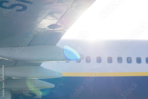 White-blue-yellow plane before takeoff