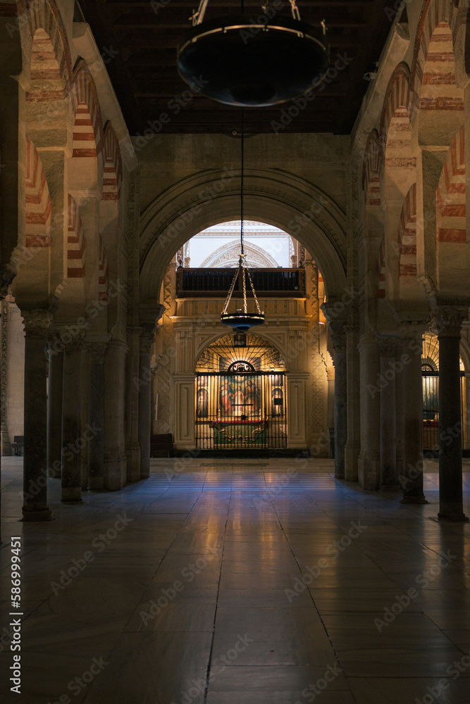 Arches and columns of the Mosque-Cathedral of Cordoba, Andalusia, Spain.