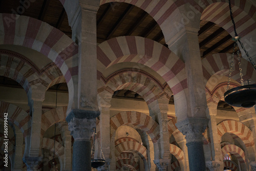 Arches and columns of the Mosque-Cathedral of Cordoba, Andalusia, Spain.