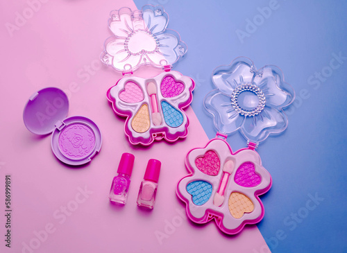 Children's set of decorative cosmetics for a little girl. Flat lay.