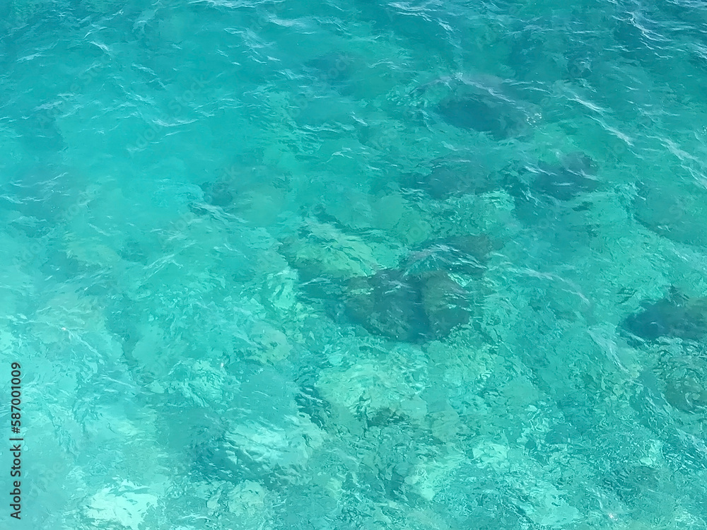 blue surface of transparent clear sea, beautiful natural background or texture