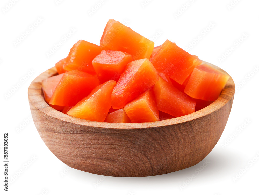 Canned papaya cubes in a wooden plate on a white background. Isolated Canned papaya cubes in a wooden plate on a white background. Isolated