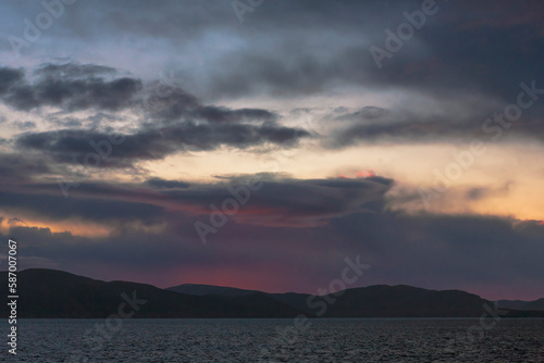 Unsettled and threatening dawn over Rolvsøysundet, Måsøy, Finnmark, Northern Norway
