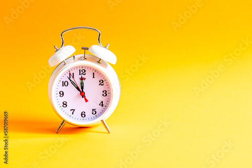 alarm clock on a color background