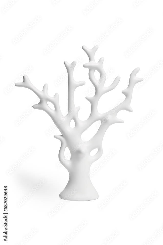 Close-up shot of a ceramic tree figurine covered with glossy glaze. White ceramic statuette shaped as a tree is isolated on a white background. Front view. Close-up shot of a ceramic tree figurine covered with glossy glaze. White ceramic statuette shaped as a tree is isolated on a white background. Front view.