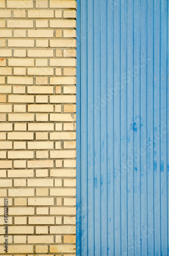 brick wall and blue metal door