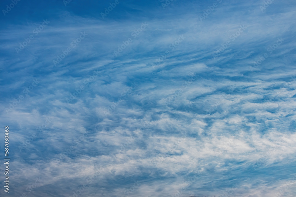 Clouds on blue sky - natural background. Earth's atmosphere