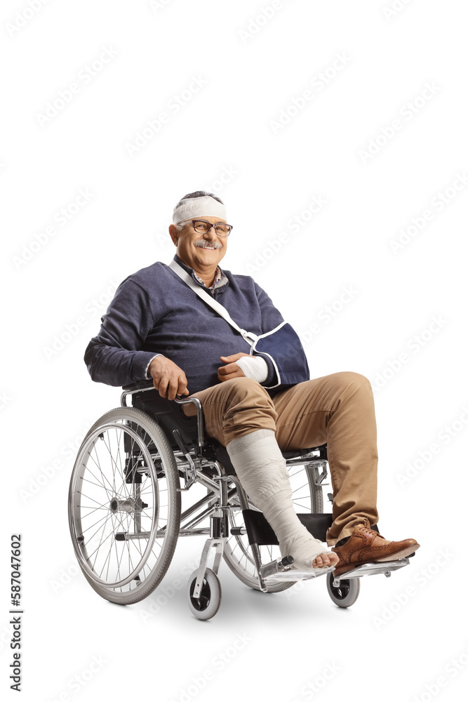 Mature man with a broken arm and bandage on head sitting in a wheelchair Mature man with a broken arm and bandage on head sitting in a wheelchair