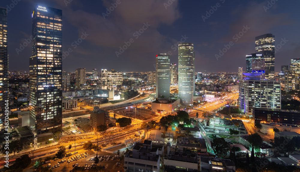 Tel Aviv-Yafo, Israel - September 23, 2020: Tel Aviv night aerial panorama. Modern glass skyscrapers Tel Aviv-Yafo, Israel - September 23, 2020: Tel Aviv night aerial panorama. Modern glass skyscrapers
