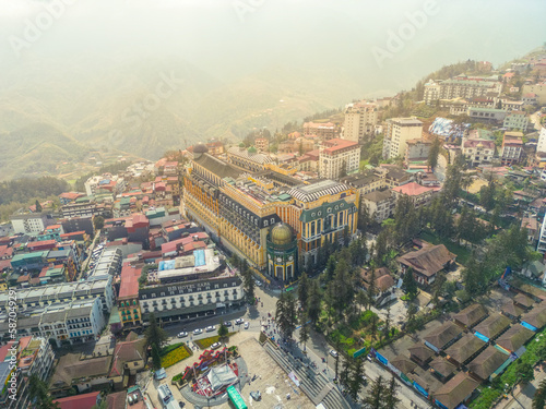 Aerial view of landscape at the hill town in Sapa city, Lao Cai Province, Vietnam in Asia with the sunny light and sunset, mountain view in the clouds