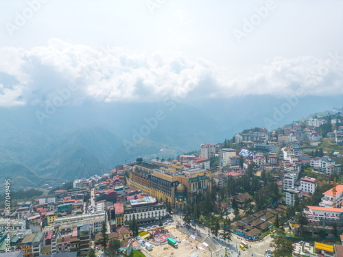 Aerial view of landscape at the hill town in Sapa city, Lao Cai Province, Vietnam in Asia with the sunny light and sunset, mountain view in the clouds