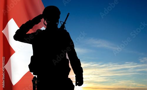 Silhouette of a soldier with Switzerland flag on sky. EPS10 vector
