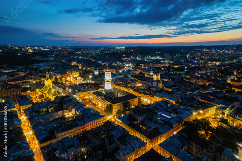 panoramic view on sunset above old european city. © Ryzhkov Oleksandr