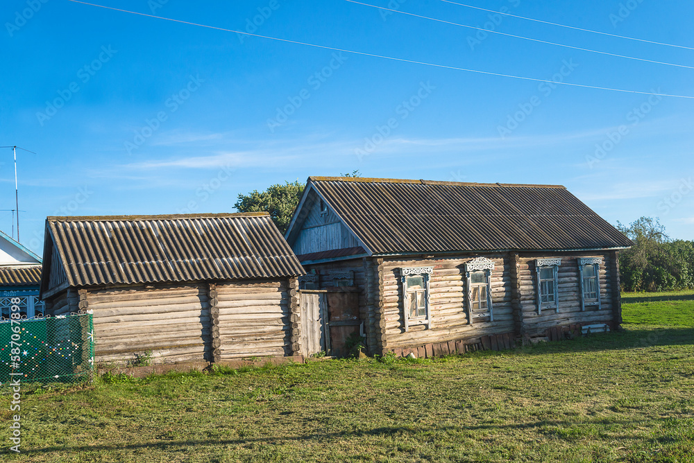 Old wooden russian house on the sunny summer day