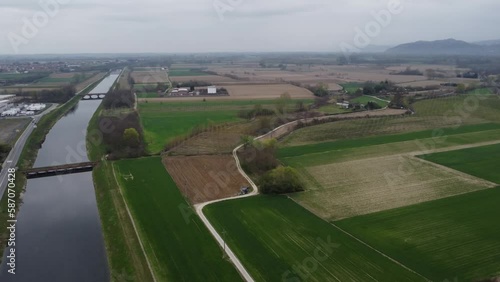 Vista aerea della pianura padana, terreni agricoli dedicati all'agricoltura irrigati dal Canale Cavour affluente del fiume Po in secca durante la siccità della primavera in Piemonte photo
