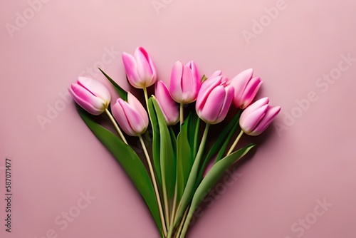 Beautiful composition spring flowers. Bouquet of pink tulips flowers on pastel pink background. Valentine's Day, Easter, Birthday, Happy Women's Day, Mother's Day. Flat lay, top view, copy space © DESIGN