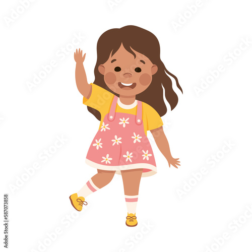 Cute happy little girl waving Hello. Brunette girl dressed yellow t-shirt and pink sundress showing greeting gesture cartoon vector illustration