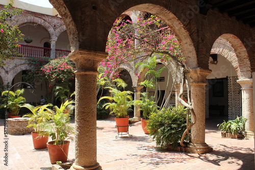 Interior square courtyard with trees, flowers, arches Convent (Convento) of Santa Cruz de la Popa Cartagena Colombia