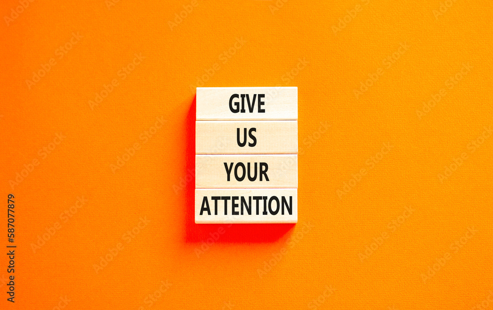 Give us your attention symbol. Concept words Give us your attention on wooden block. Beautiful orange table orange background. Motivational business give us your attention concept. Copy space. Give us your attention symbol. Concept words Give us your attention on wooden block. Beautiful orange table orange background. Motivational business give us your attention concept. Copy space.