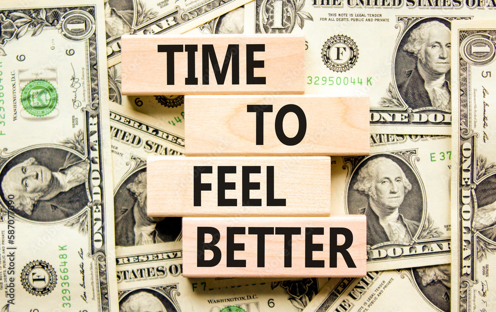 Time to feel better symbol. Concept words Time to feel better on wooden block. Beautiful background from dollar bills. Dollar bills. Motivational business time to feel better concept. Copy space