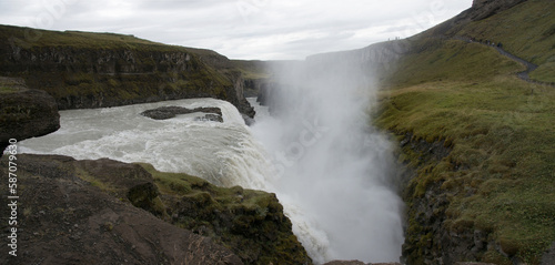 Gullfoss waterfall and walking path with tourists
