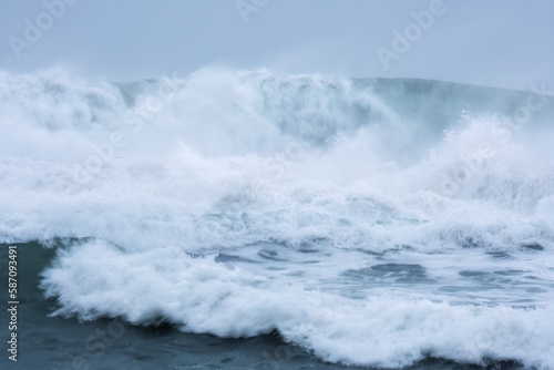 crashing waves off chapel Porth beach Cornwall UK 