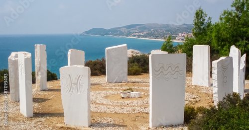 Metalleia or Mines beach in Thassos island Greece with marble stones and turquoise blue water ideal for summer vacation photo