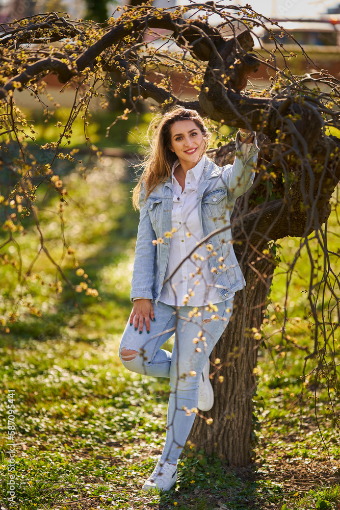 Pakistani young woman in a park, springtime Pakistani young woman in a park, springtime