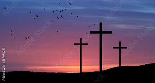 Christian crosses on hill outdoors at sunrise. Resurrection of Jesus.