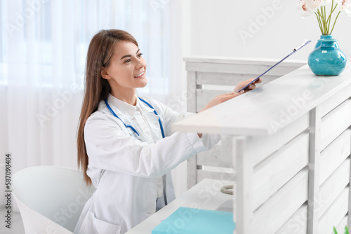 Smiling female doctor or me...
