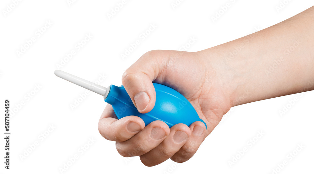 Hand holding blue enema, cut out Hand holding blue enema, cut out