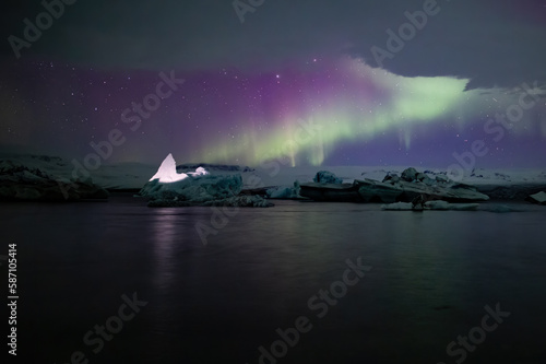 Illuminated iceberg in Jokulsarlon lagoon, Iceland