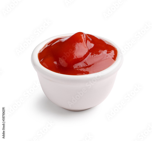 Bowl of tasty ketchup isolated on white background