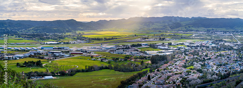 Panoramic view looking down on city, airport