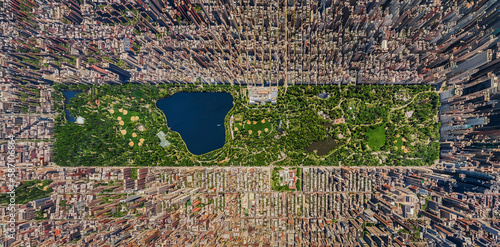 Beautiful top down view of the Manhattan island in New York city. Central park in a shape of square visible from above. Center of the New York city.