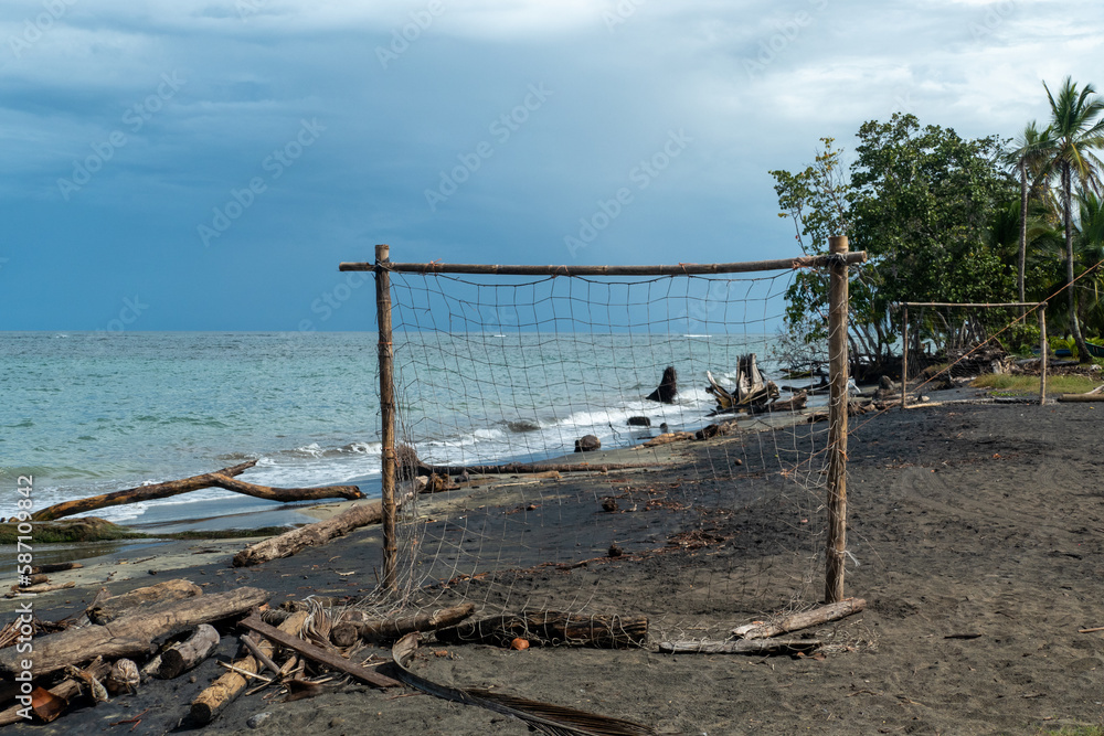 beach of Cocles on the Caribbean side of Costa Rica, Puerto Viejo de Talamanca with an handmade soccer coal made of palm trees beach of Cocles on the Caribbean side of Costa Rica, Puerto Viejo de Talamanca with an handmade soccer coal made of palm trees