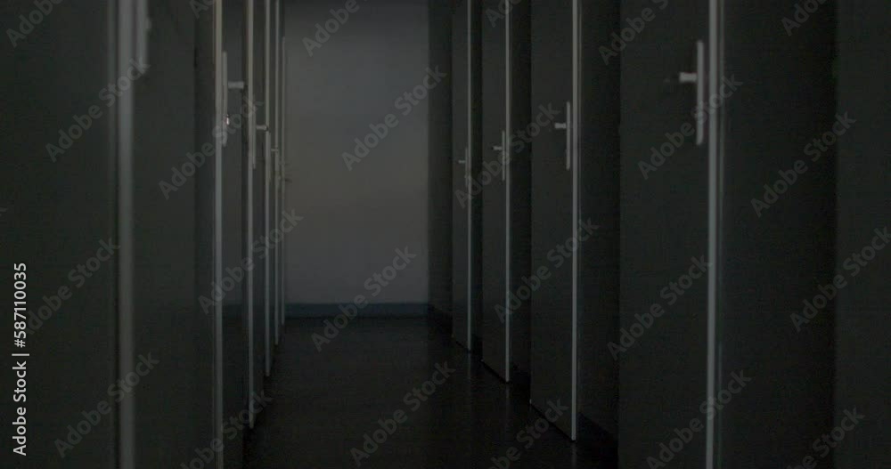 Dark long corridor, scary. Place of arrest of pre-trial criminals. Many rooms with doors for the individual detention of the prisoner. Dark long corridor, scary. Place of arrest of pre-trial criminals. Many rooms with doors for the individual detention of the prisoner.