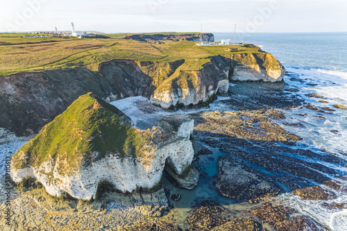 Sunny unconventional beach day. Drone aerial view of white chalk cliffs at Flamborough Head. High quality photo photo