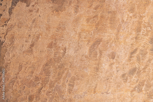 Grunge rusty orange brown metal surface, steel stone background texture.