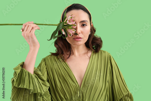 Young woman in dress with a...