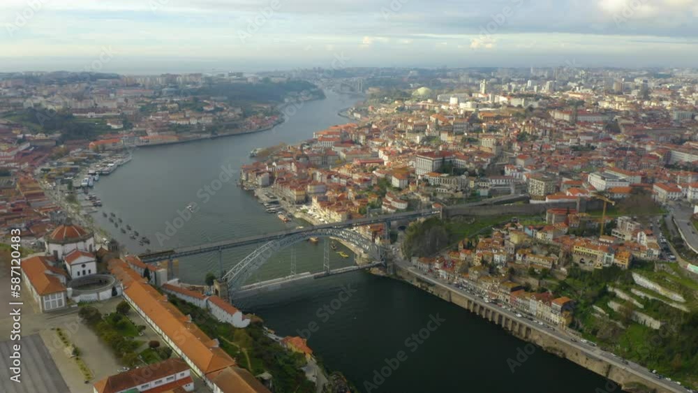 Portugal Porto aerial video city centre. Aerial view of old town and Dom Luis Bridge over the Douro river. Drone Footage Travel Architecture Clerigos Church Tower Baroque Style Cityscape. Portugal Porto aerial video city centre. Aerial view of old town and Dom Luis Bridge over the Douro river. Drone Footage Travel Architecture Clerigos Church Tower Baroque Style Cityscape.