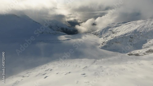 Aerial Reveal Soaring Over Glacial Waterfall to Mendenhall Glacier, AK